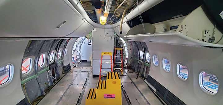 Image of an aircraft cabin during modifications