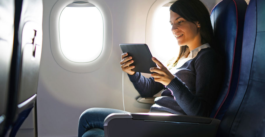 Airline Passenger with Tablet